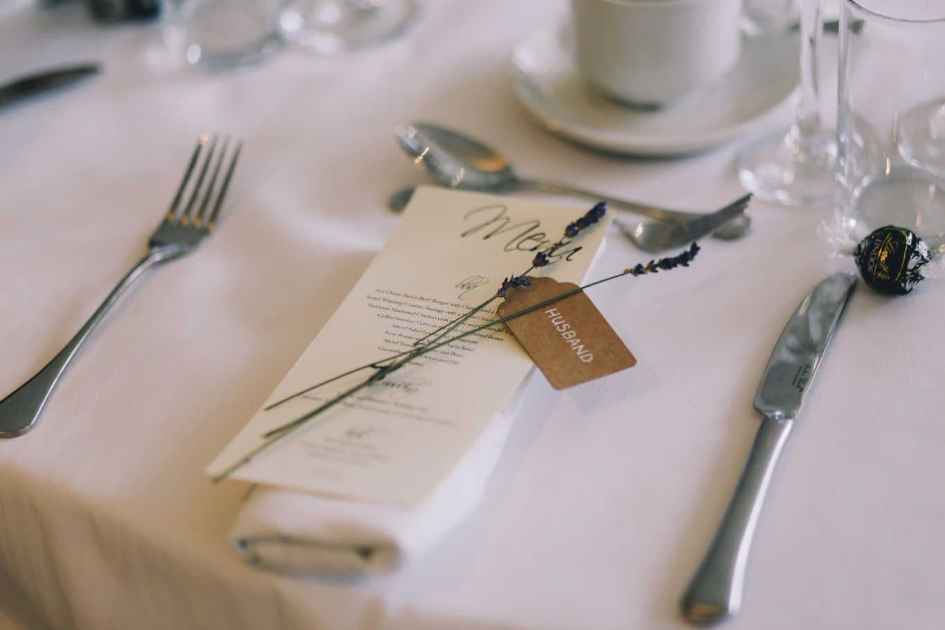 Wedding table setting with menu and cutlery